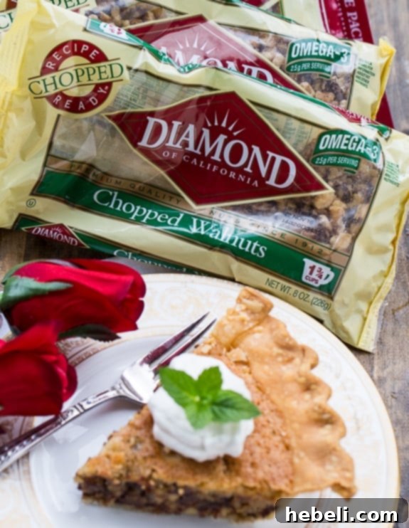 Perfectly baked Kentucky Derby Pie, golden brown and glistening with its signature chocolate and walnut filling.