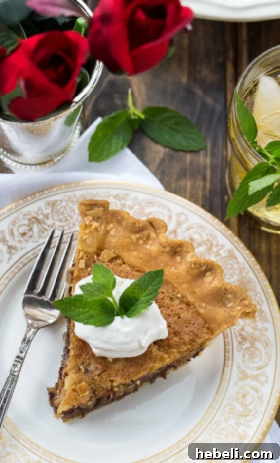 A close-up view of a whole Kentucky Derby Pie, showcasing the texture and richness of its filling.