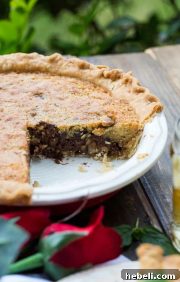 Rustic presentation of Kentucky Derby Pie, emphasizing its homemade charm and delicious ingredients.