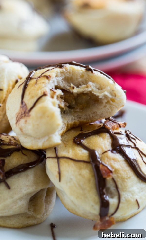 Stacked Banana Peanut Butter Fritters on a white plate