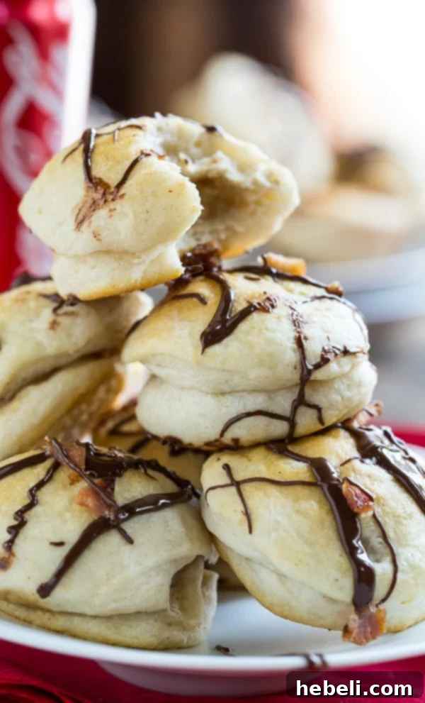 Finished Banana Peanut Butter Fritters topped with chocolate and bacon