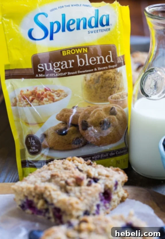 Guilt-Free Blueberry Coffee Cake 4 Freshly baked Lightened-Up Blueberry Coffee Cake, showing its golden-brown crust and inviting texture with blueberries peeking through