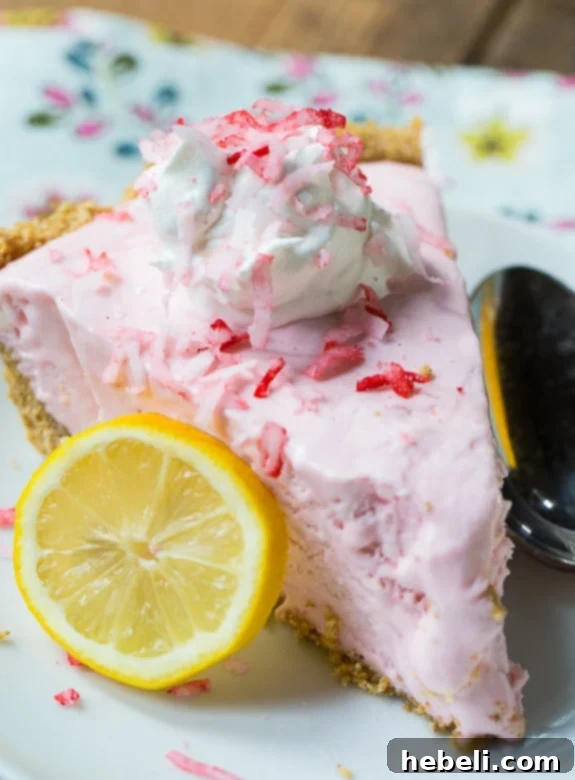 Slices of No-Bake Pink Lemonade Icebox Pie on a plate, ready to be enjoyed
