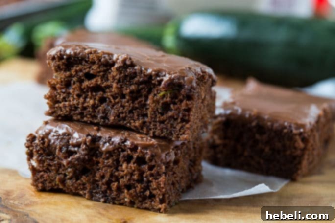Chocolate Zucchini Sheet Cake - A delicious and moist dessert perfect for summer gatherings.