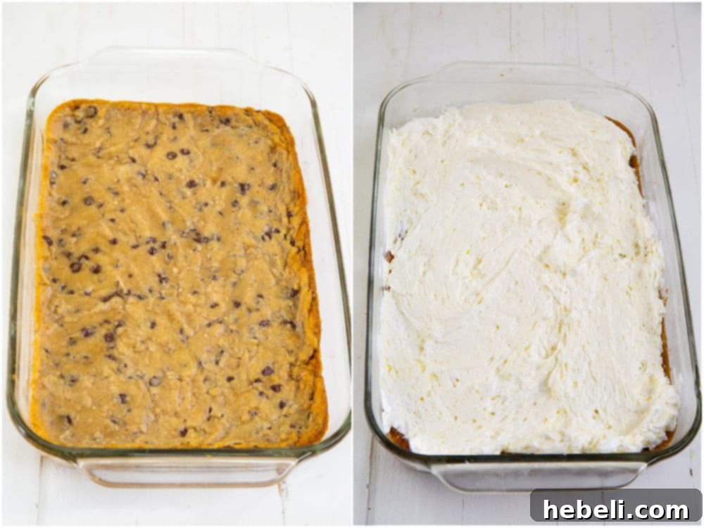 The assembled Chocolate Chip Cookie Delight with baked cookie crust and creamy cream cheese layer spread over it, ready for the next layers.