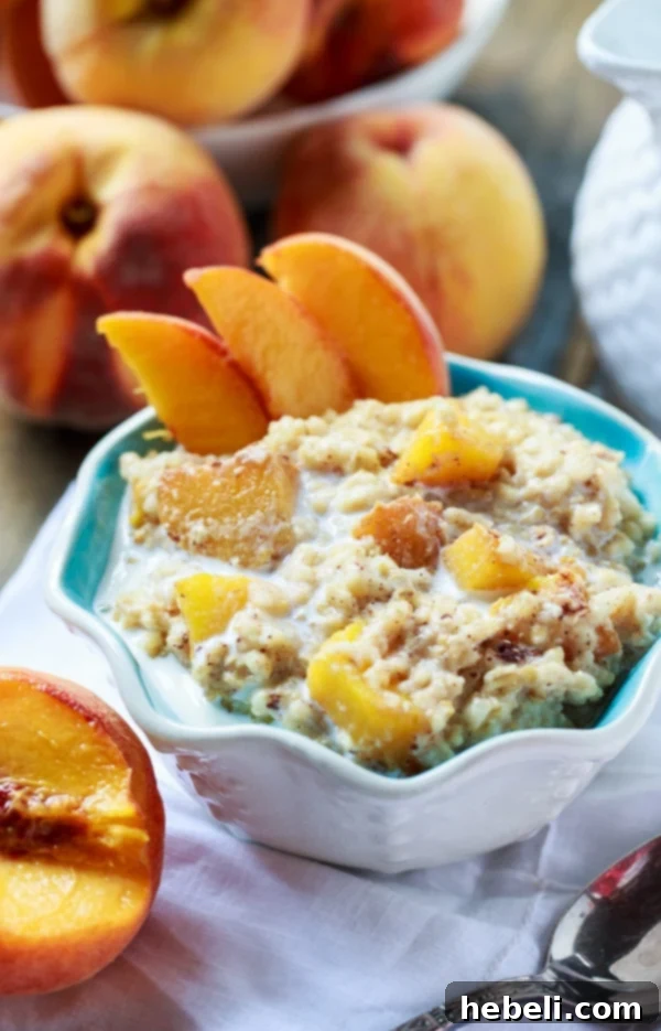 Creamy Slow Cooker Peach Oatmeal 3 Close-up of Crock Pot Peaches and Cream Oatmeal simmering in a slow cooker, showing its creamy texture.