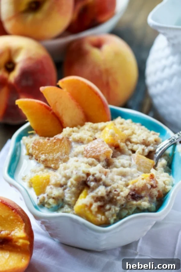 Creamy Slow Cooker Peach Oatmeal 4 The Crock Pot Peaches and Cream Oatmeal cooking gently in a slow cooker, ready to be served.