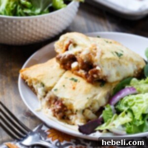 Crescent Lasagna with golden-brown crust and cheesy layers, ready to be served.