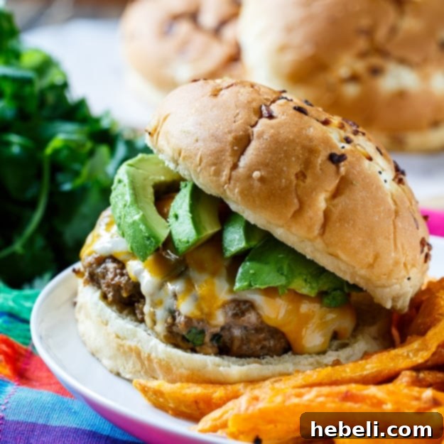Smoky Chipotle Pork Burgers 2 Deliciously grilled Chipotle Pork Burgers ready for serving