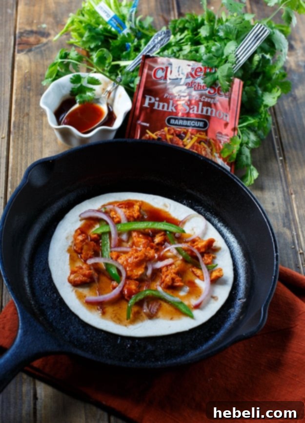 Another mouth-watering shot of a BBQ Salmon Tortilla Pizza with Chicken of the Sea Pouched Salmon