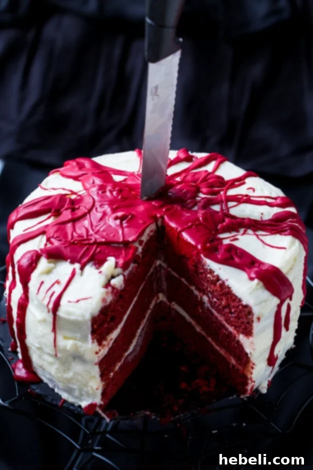 Velvet Crimson Decadence 5 Bloody Red Velvet Cake ready for a ghoulish Halloween display.