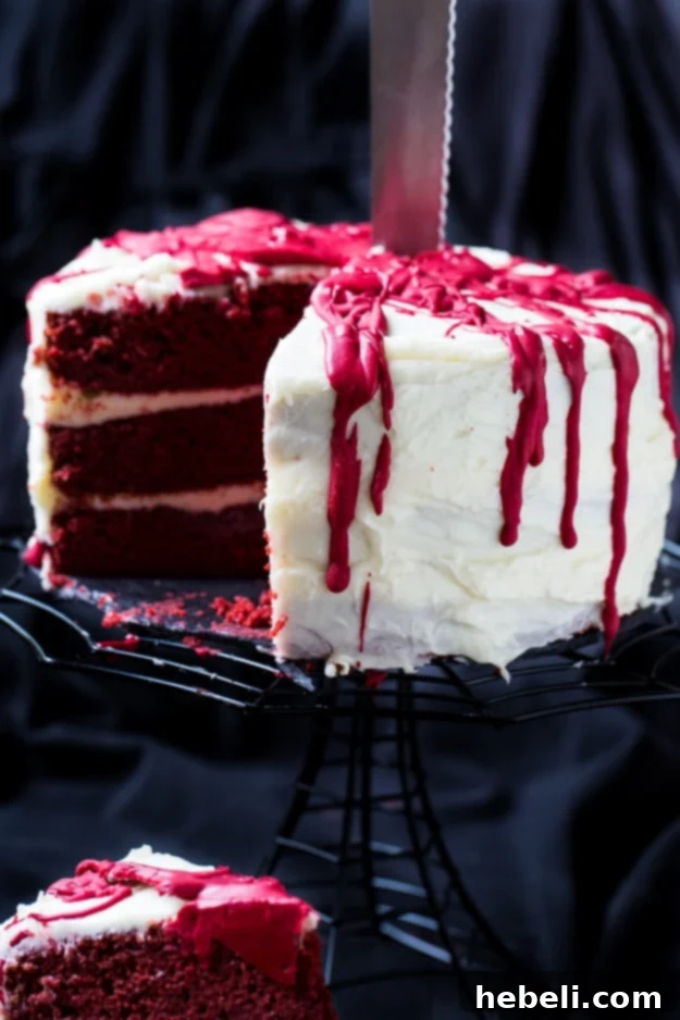 Velvet Crimson Decadence 7 A bloody knife next to the Bloody Red Velvet Cake for Halloween.