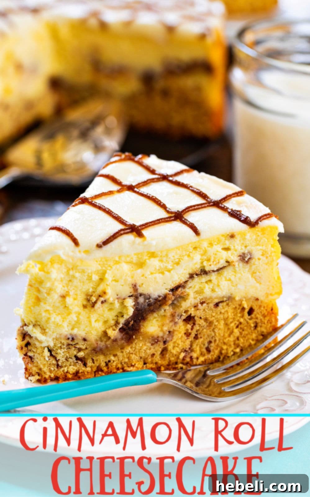 Cinnamon Swirl Cheesecake 6 A large whole Cinnamon Roll Cheesecake, beautifully glazed and drizzled, presented on a wooden board, showcasing its impressive size and inviting texture.