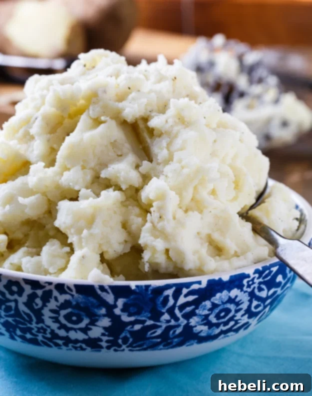 Close-up of fluffy Duke's Mayonnaise mashed potatoes, highlighting their smooth and creamy consistency.