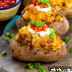 Double Stuffed Taco Potatoes in a recipe card format.