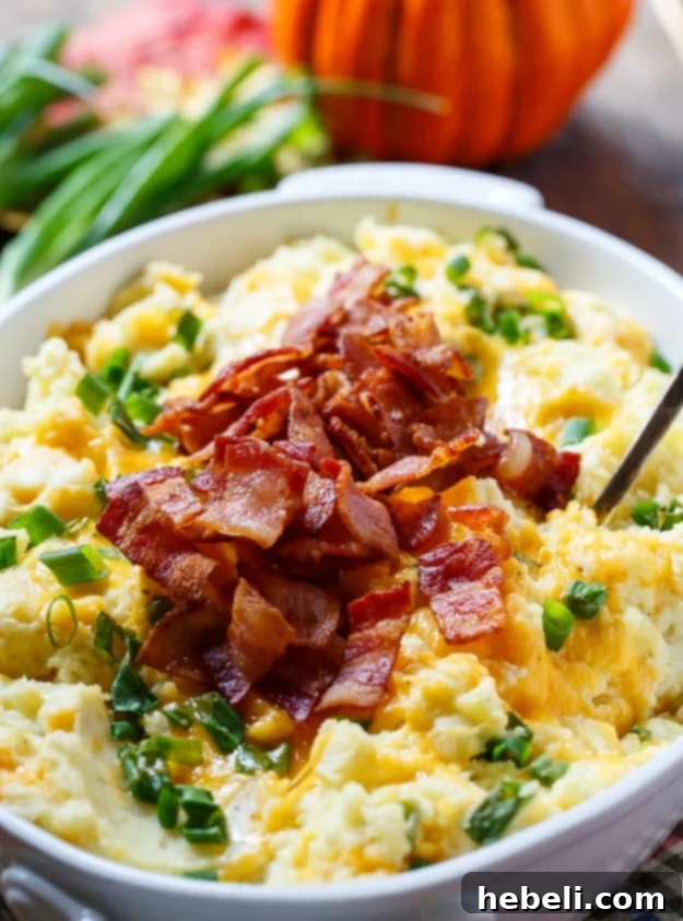 A close-up of the delicious Loaded Mashed Potato Casserole.