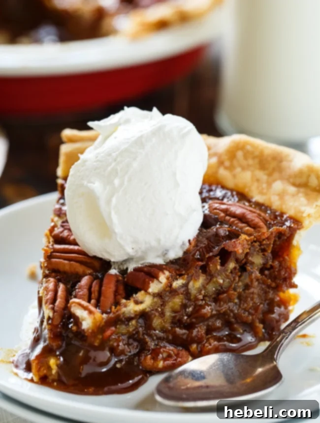 Sweet and Salty Pecan Perfection 6 A delicious slice of salted caramel pecan pie, perfectly golden and ready to be enjoyed.