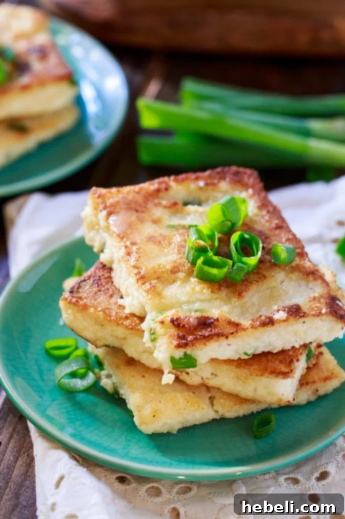 Creamy Mascarpone Grit Cakes 4 Mascarpone Grit Cakes arranged artfully on a plate, ready to be served