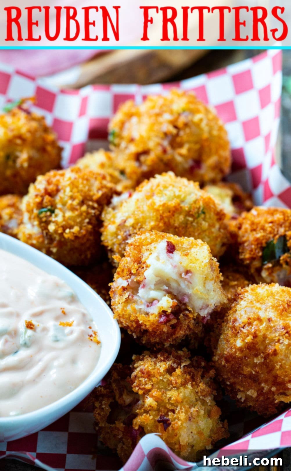 Reuben Frittes in basket with small bowl of Thousand Island dressing.