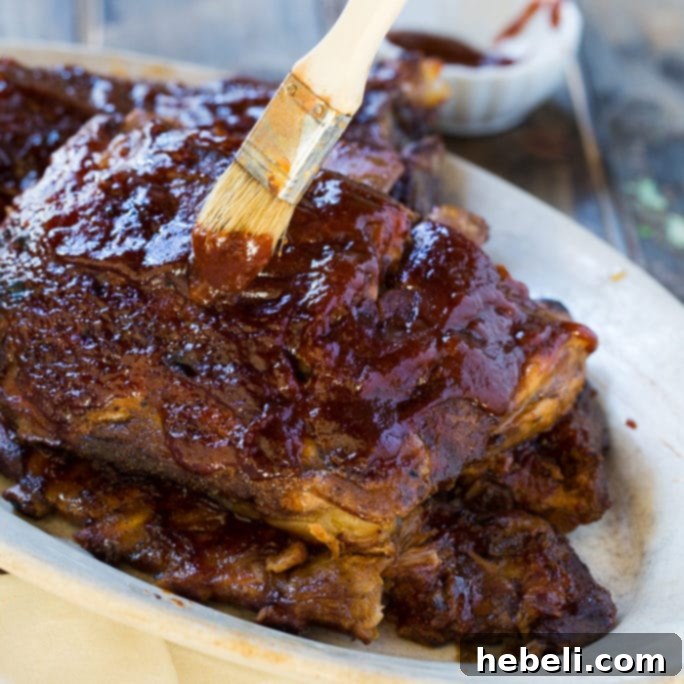 Appetizing slow cooker ribs, perfectly glazed with sauce, presented on a rustic plate, ready for a delightful meal