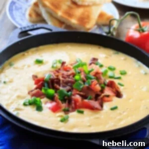 Hot Brown Fondue with toast points, ideal for entertaining.