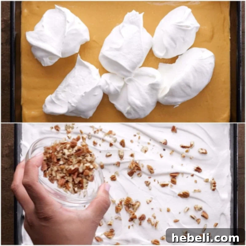 Spreading the final layer of whipped topping and garnishing with chopped pecans.
