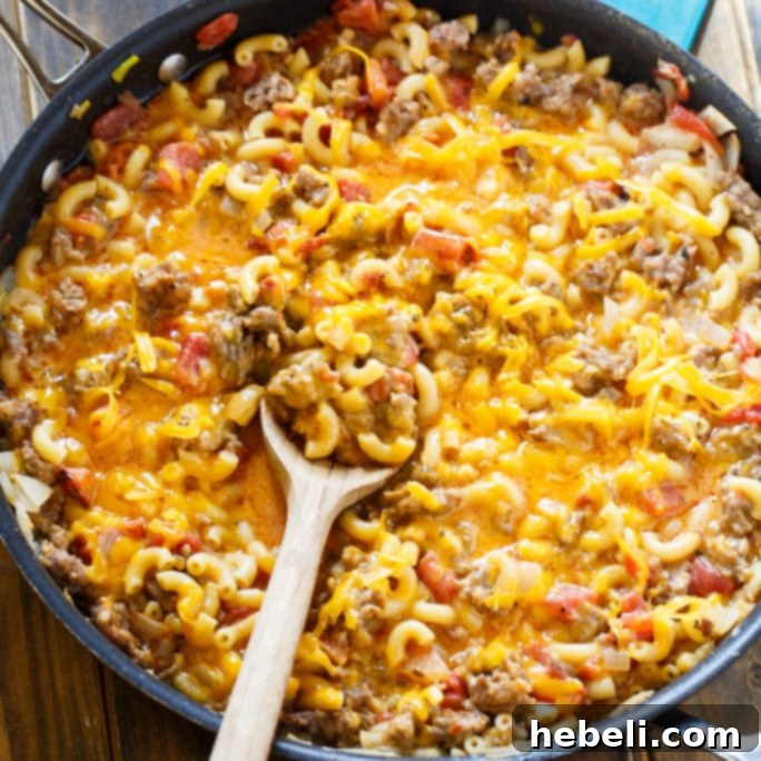 Delicious Stovetop Sausage Mac and Cheese, ready in under 30 minutes with just one pot.