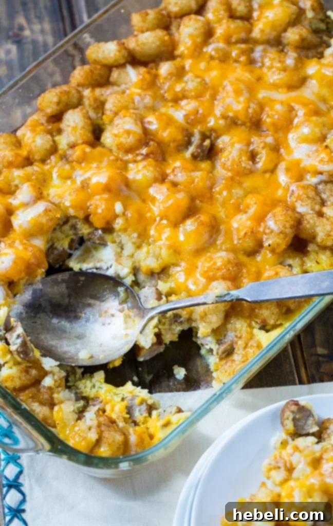 Breakfast Tater Tot Casserole with a perfect golden-brown top, ready for serving.