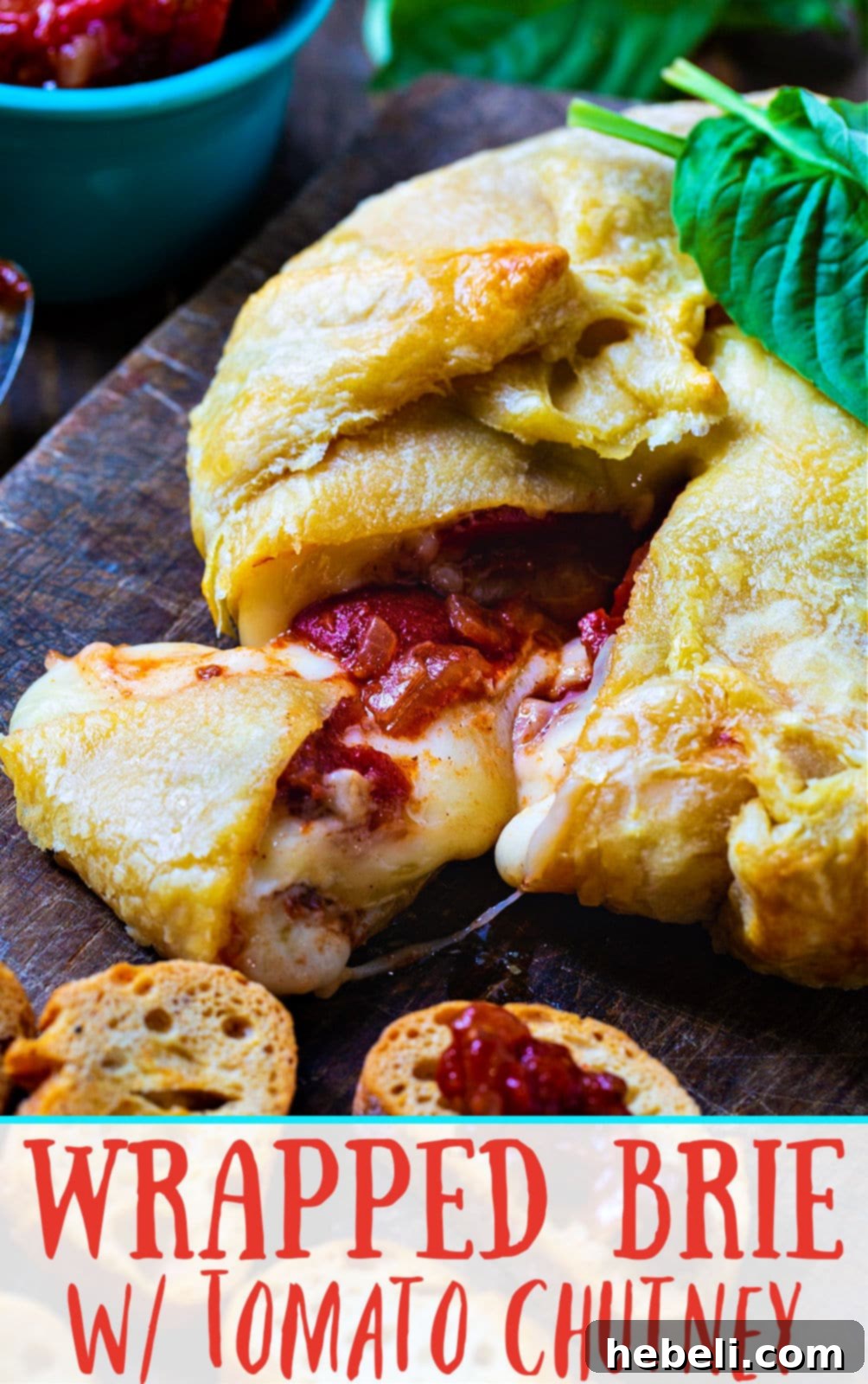 Golden Brie Bake with Tangy Tomato Chutney 6 Wrapped Brie with Tomato Chutney- a tangy chutney is such a great pair with gooey, melted brie cheese.