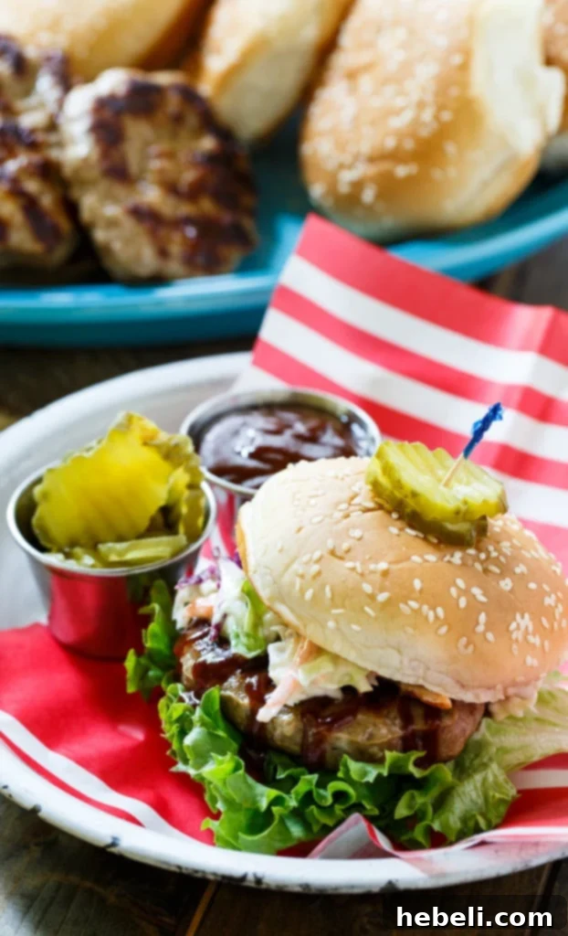 Southern BBQ Pork Burgers with creamy coleslaw and BBQ sauce.
