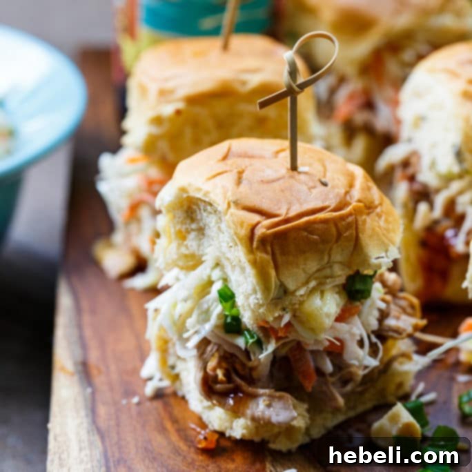 Hawaiian Sliders with Tropical Slaw, showcasing both pulled pork and SPAM versions on sweet rolls