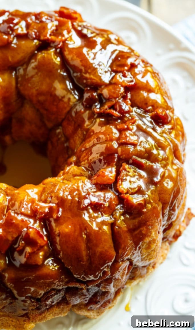 Close-up of Bacon Maple Monkey Bread, highlighting the rich maple glaze and savory bacon.