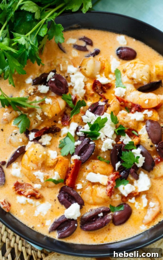 Saucy Shrimp Bonefish Grill Style 3 Close-up of creamy Saucy Shrimp with feta and olives, ideal for a quick and impressive appetizer.