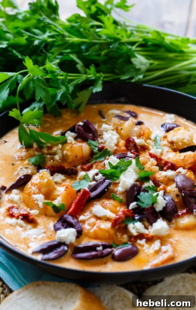 Saucy Shrimp Bonefish Grill Style 5 A bowl of Bonefish Grill copycat Saucy Shrimp served with toasted bread for dipping.