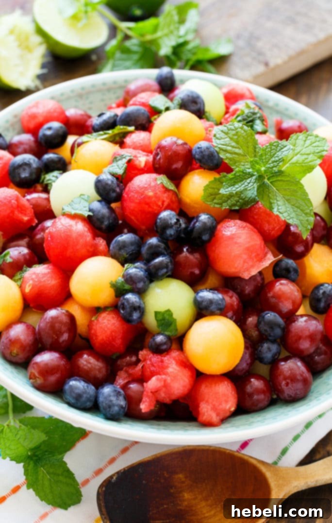Refreshing Mojito Fruit Salad with vibrant fruit and a hint of lime and mint.