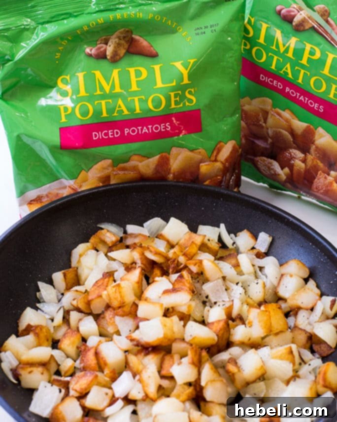 Farmhouse Bacon Potato Quiche 4 A whole Bacon and Potato Quiche cooling on a wire rack, ready to be served.