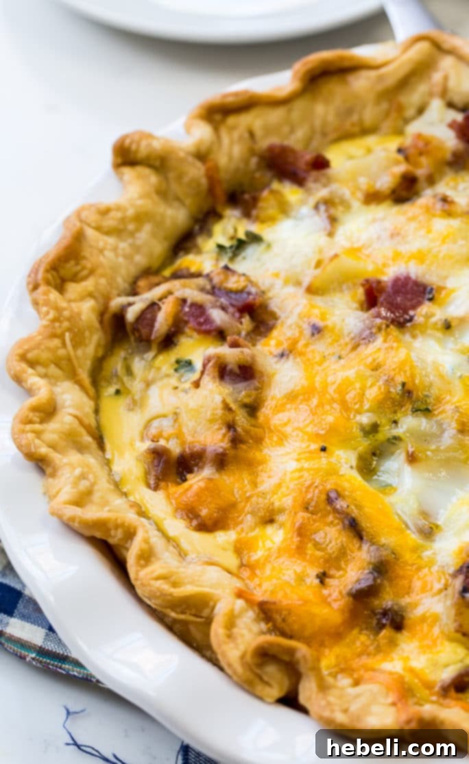 Farmhouse Bacon Potato Quiche 5 Ingredients for Bacon and Potato Quiche, including diced potatoes, bacon, and cheese.