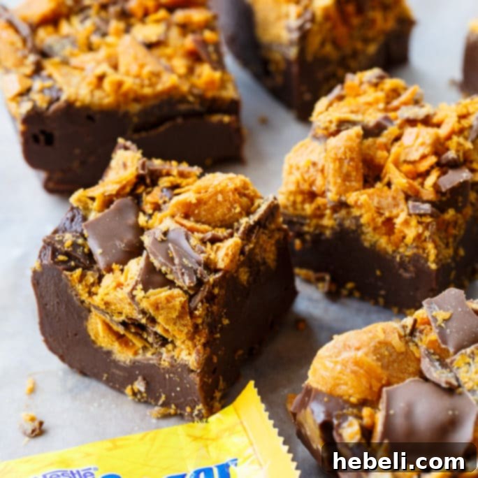 Delicious Butterfinger Fudge with candy bar pieces on top