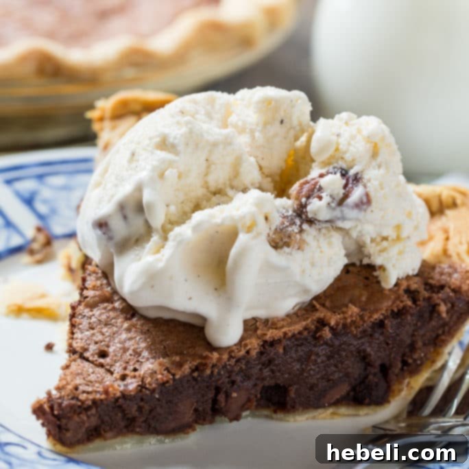 Brownie Pie: a rich, fudgy brownie baked into a flaky pie crust. The ultimate chocolate dessert.