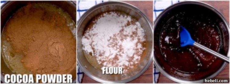 Cocoa powder and flour being stirred into the brownie batter.