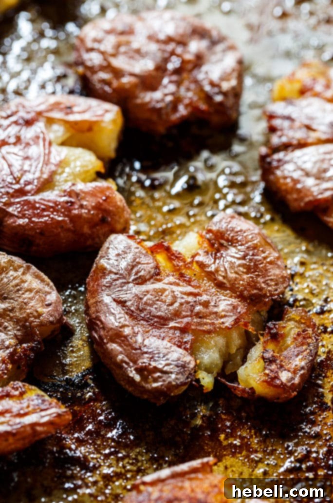 Zesty Salt & Vinegar Roasties 4 Roasted Salt and Vinegar Potatoes piled high, showing off their golden crunch.