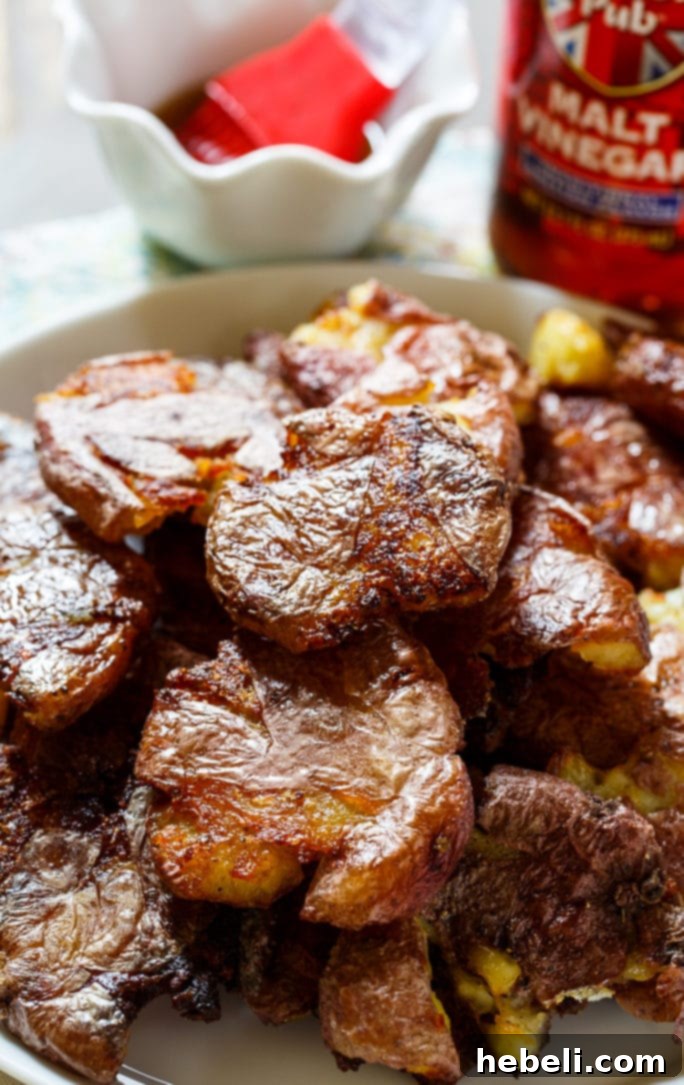 Zesty Salt & Vinegar Roasties 5 A bowl of roasted salt and vinegar potatoes ready to be enjoyed.