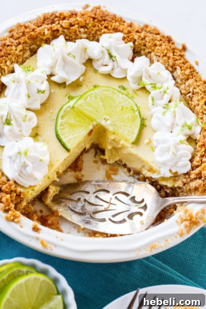 Perfectly creamy lime pie filling nestled in a tropical coconut macadamia nut crust