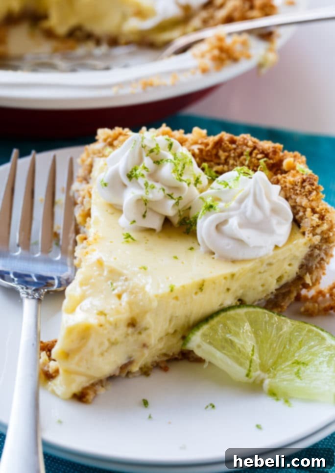 Homemade Lime Pie with Coconut Macadamia Crust and fluffy coconut whipped cream
