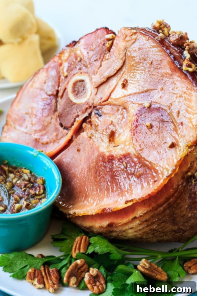 Praline Glazed Ham, beautifully glazed and ready to serve on a festive platter