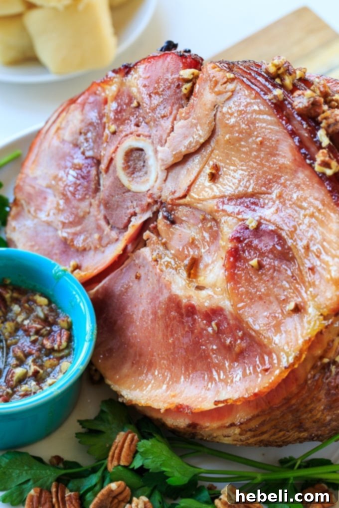 Close-up of the spiral cut ham slowly baking in the oven, ready for the praline glaze