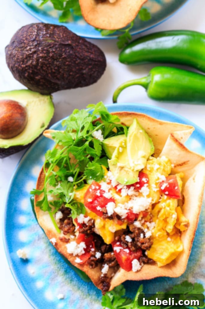 Spicy Chorizo Ranchero Skillet 3 Close-up of fresh Mexican chorizo sausage cooking in a pan for breakfast ranchero.