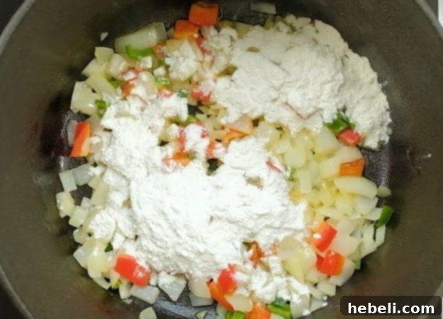 Creamy Spicy Chicken & Sweet Corn Chowder 5 Flour and paprika added to vegetables