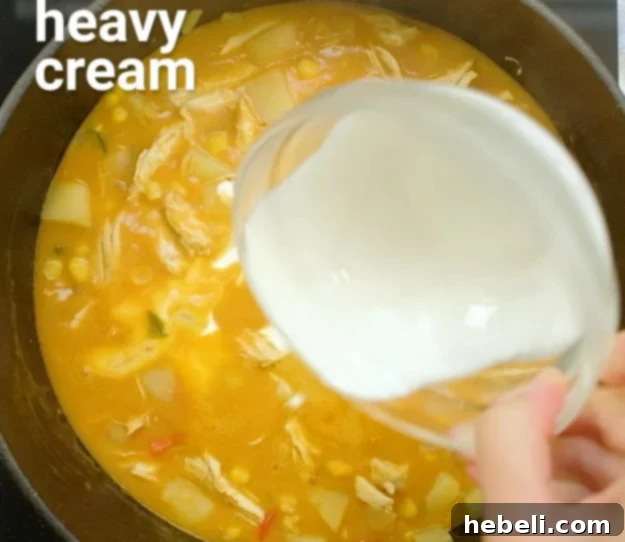 Creamy Spicy Chicken & Sweet Corn Chowder 8 Adding heavy cream to the finished chowder