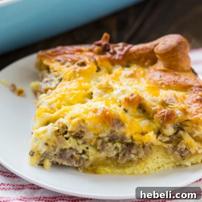 Sausage Crescent Bake 2 Sausage and Crescent Roll Casserole: A perfect golden crust topped with savory sausage, fluffy eggs, and melted cheese